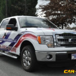 Affordable Freedom Mobility corporate pick-up wrap with lettering and custom graphics
