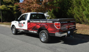 CagedN corporate wrap with custom graphics, lettering, and logos