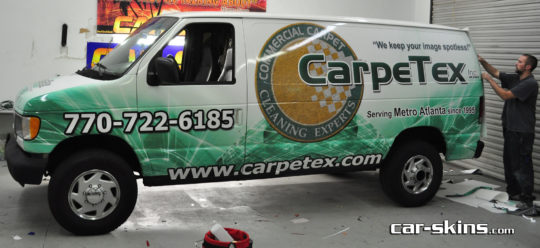 CarpeTex coporate van wrap with letter, custom graphics, and Side/hood logos.
