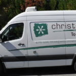 Christophe's togo corporate van wrap with side logos and lettering