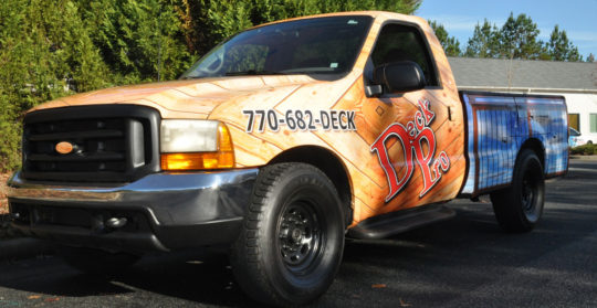 Deck Pro corporate full wrap with letter and logo