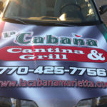 La Cabana corporate car wrap with logos and lettering