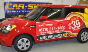 Total insurance SUV wrap with lettering and side logo
