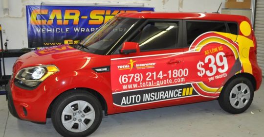 Total insurance SUV wrap with lettering and side logo
