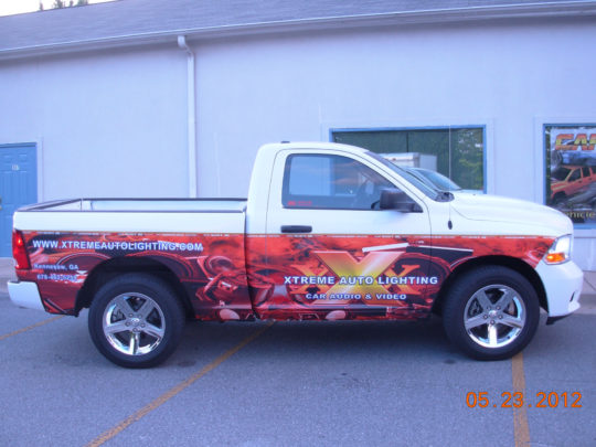 Xtreme Auto Lighting half wrap with lettering and logos.