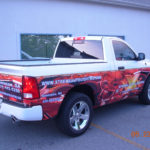 Xtreme Auto Lighting half wrap with lettering and logos.