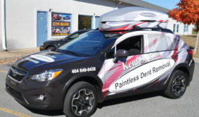 Kent D Row corporate SUV wrap with custom graphics, side/hood logo, windows, and lettering