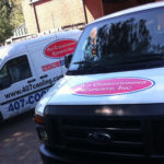 AC Experts corporate wrap with logos and lettering