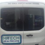 HiTech Healthcare simplist corporate van wrap with lettering and side logo.