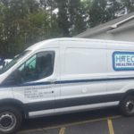 HiTech Healthcare simplist corporate van wrap with lettering and side logo.