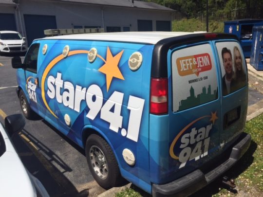 Star 94.1 custom full corporate wrap with logos, letterng, and hood.