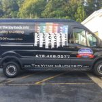Vitamin Authority simplist corporate wrap with lettering, graphics, and side logos.
