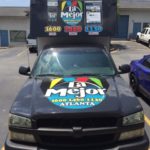 La Mejor corporate wrap with hood logo and lettering.