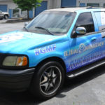 Global Managment Frim corporate wrap with hood logos, sides logos, windows, and lettering.